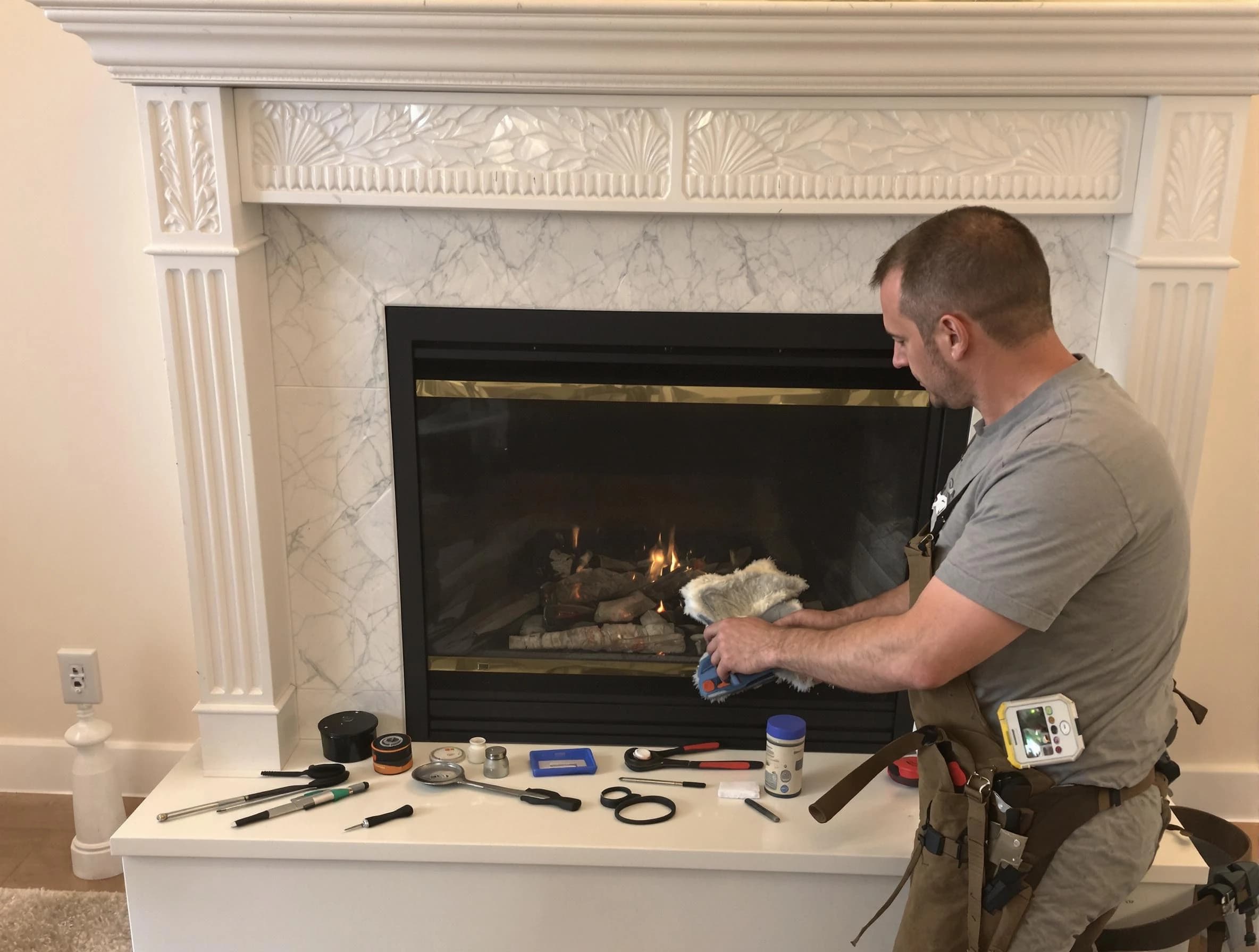 Littleton Chimney Sweep performing fireplace maintenance in Littleton, CO